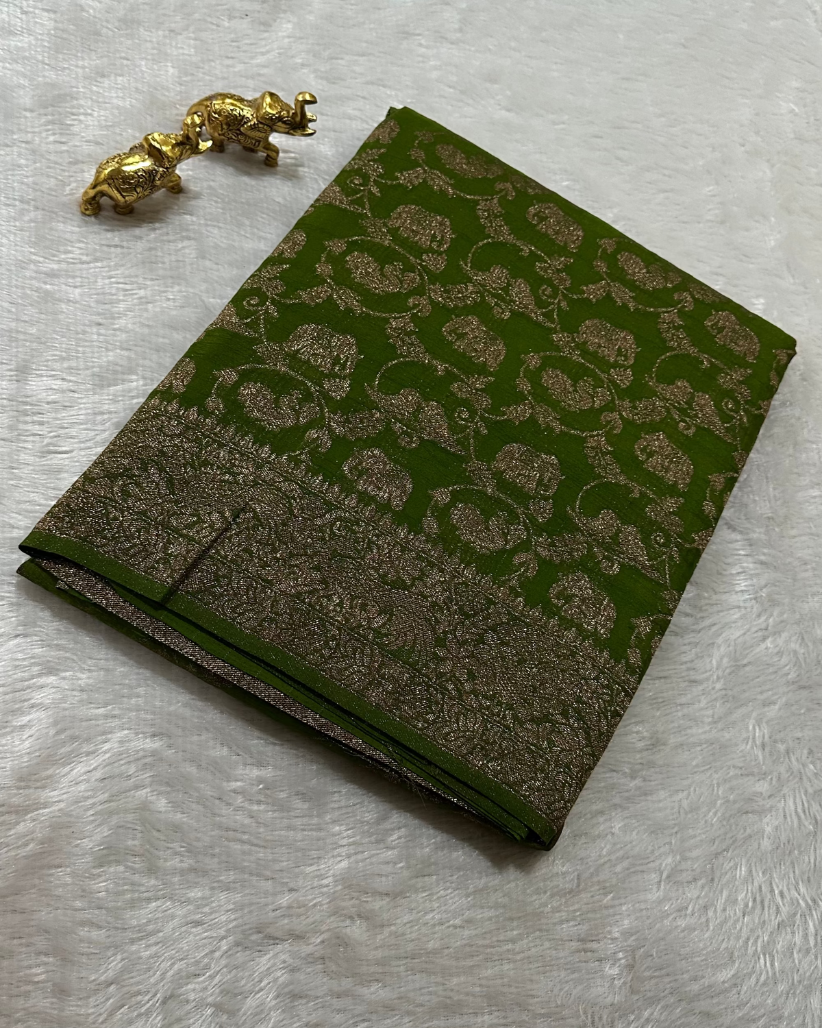 Banaras Georgette Deep Olive Green Elephant Zari Jaal Saree | Glow & Glitter Boutique