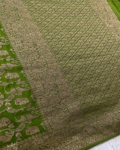 Banaras Georgette Deep Olive Green Elephant Zari Jaal Saree | Glow & Glitter Boutique
