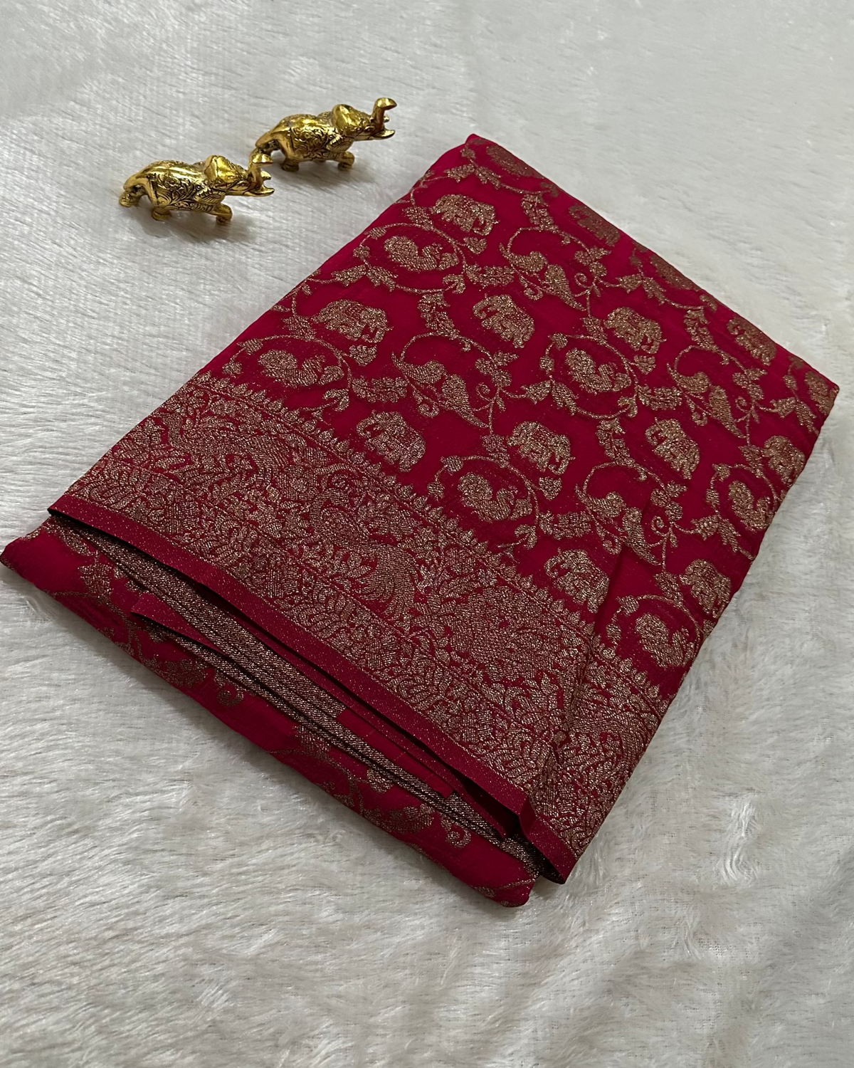 Banaras Georgette Deep Rani Pink Elephant Jaal Zari Saree | Glow & Glitter Boutique