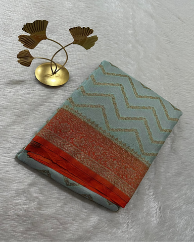 Banaras georgette silk saree Ice Blue With Burnt Orange Zari Border | Glow & Glitter Boutique