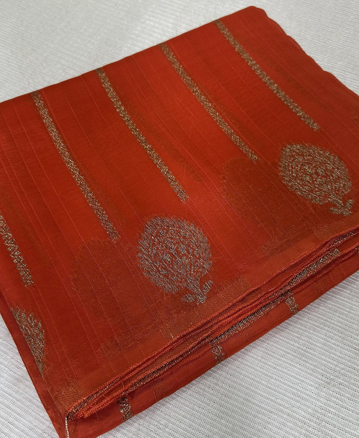 Tussar silk saree Orange with Floral Butta Design | Glow & Glitter Boutique