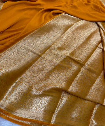 Georgette silk saree Sunset Yellow with Gold Zari Border | Glow & Glitter Boutique