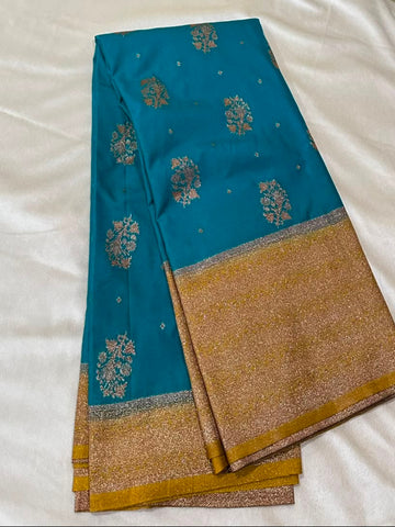 Banaras Georgette Silk Saree Teal Blue with Antique Gold Zari Border | Glow & Glitter Boutique