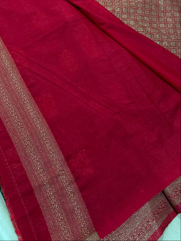 Banaras Georgette Silk Saree Bottle Green with Rani Pink Zari Border | Glow & Glitter Boutique