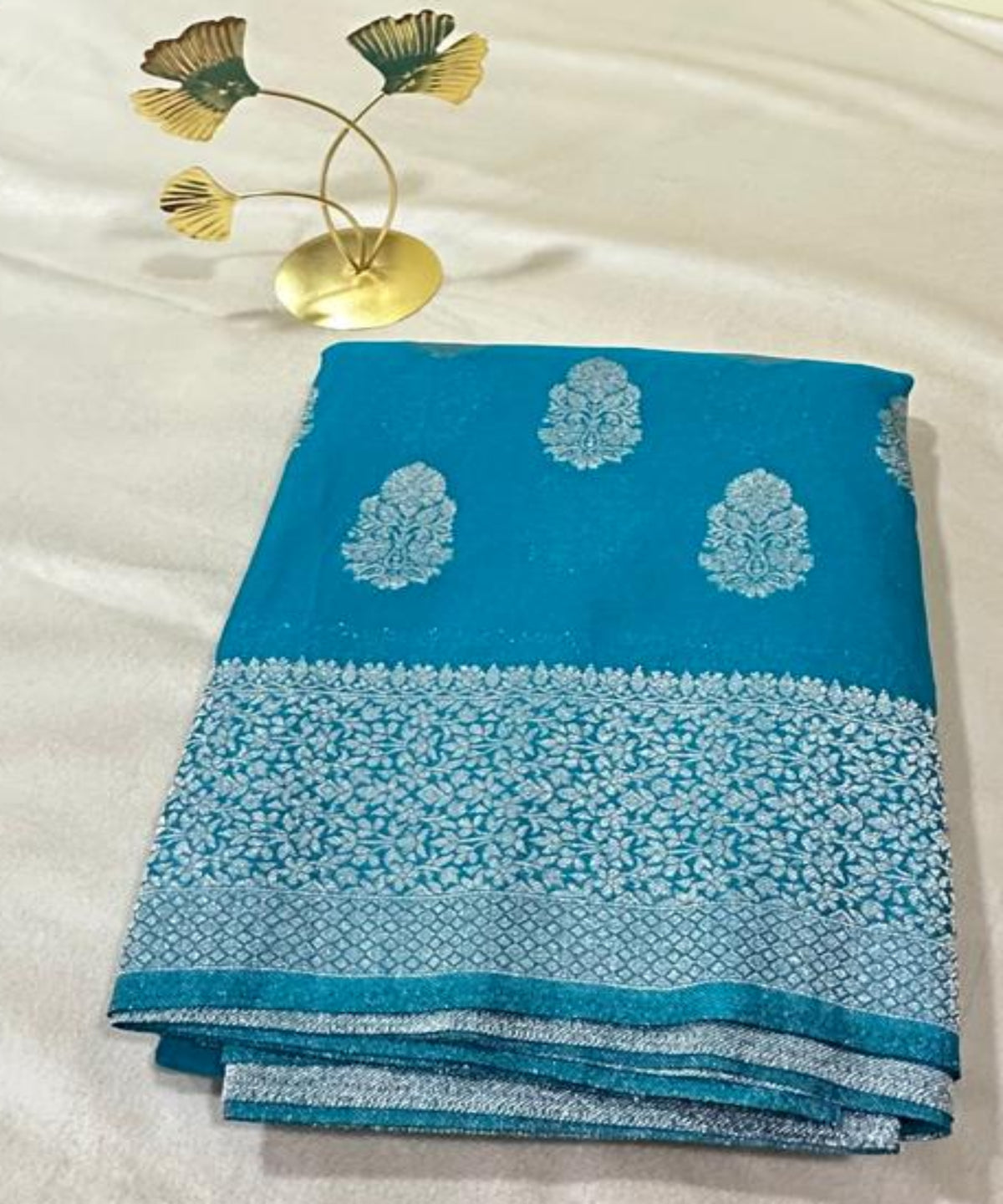 Banaras georgette silk saree Elegant Turquoise Blue with Rich Silver Zari Border | Glow & Glitter Boutique