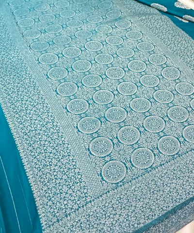 Banaras georgette silk saree Elegant Turquoise Blue with Rich Silver Zari Border | Glow & Glitter Boutique